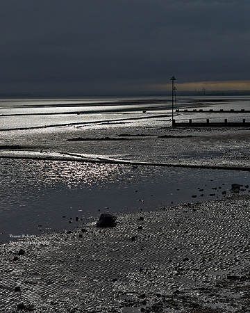East Beach reflected light on the mud