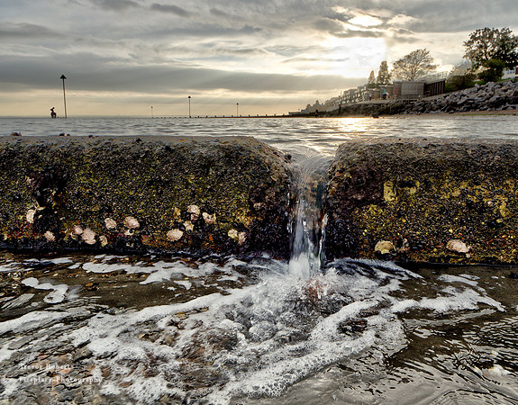 Shoeburyness East beach. Tiny waterfall from the pool