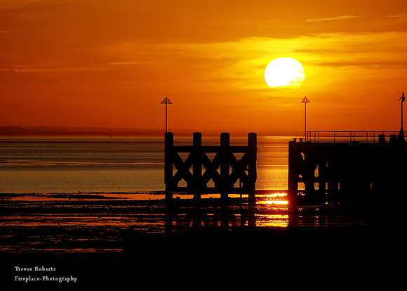 Blood red sunset at Shoeburyness,  East beach. Looking like glowing lava on the mud near Barge pier.- Favourite foto !