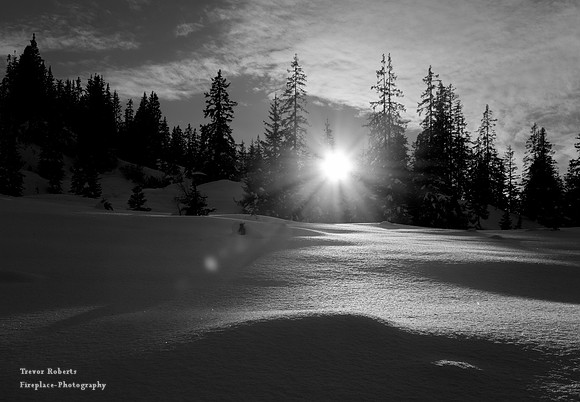 Sun slowly disappearing over the fresh snow. jan 2021